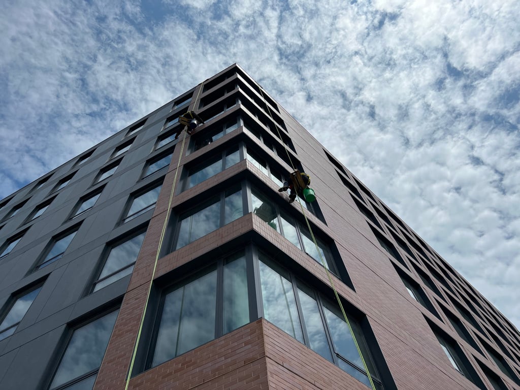 Ascent Building Window Workers cleaning the high rise window.
