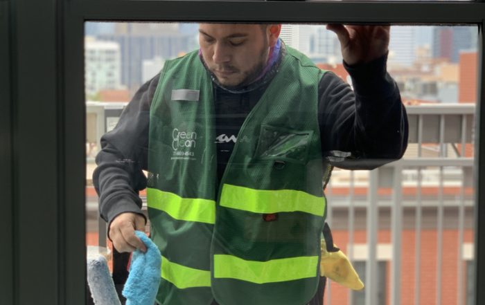 Window washer Chicago getting ready to start cleaning the exterior of an apartment.