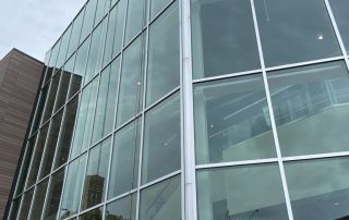Descending down a mid-rise business to clean their windows