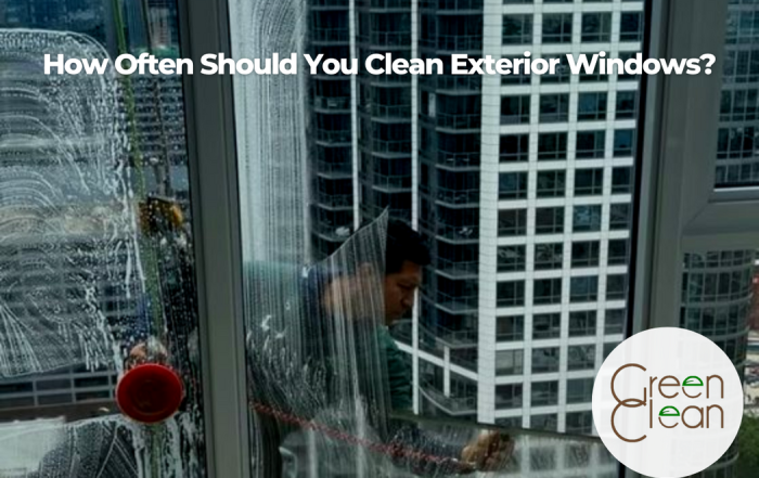 Worker washing windows on a Chicago skyscraper