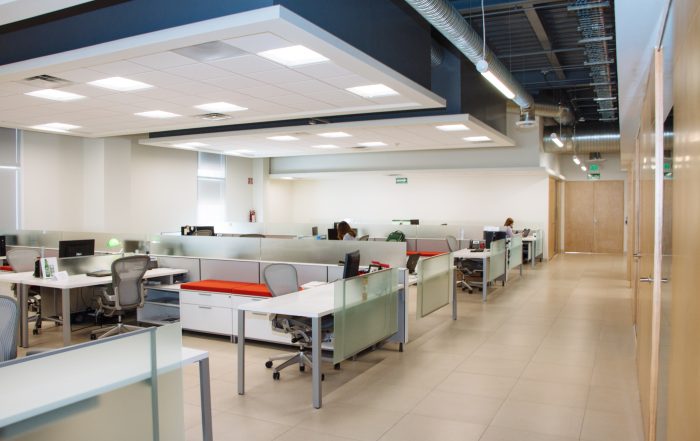 Modern open-plan office after professional deep office cleaning showing spotless desks and bright lighting in Chicago workspace.